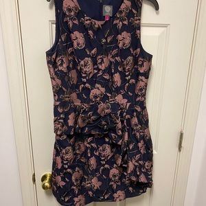 dress with front asymmetrical peplum